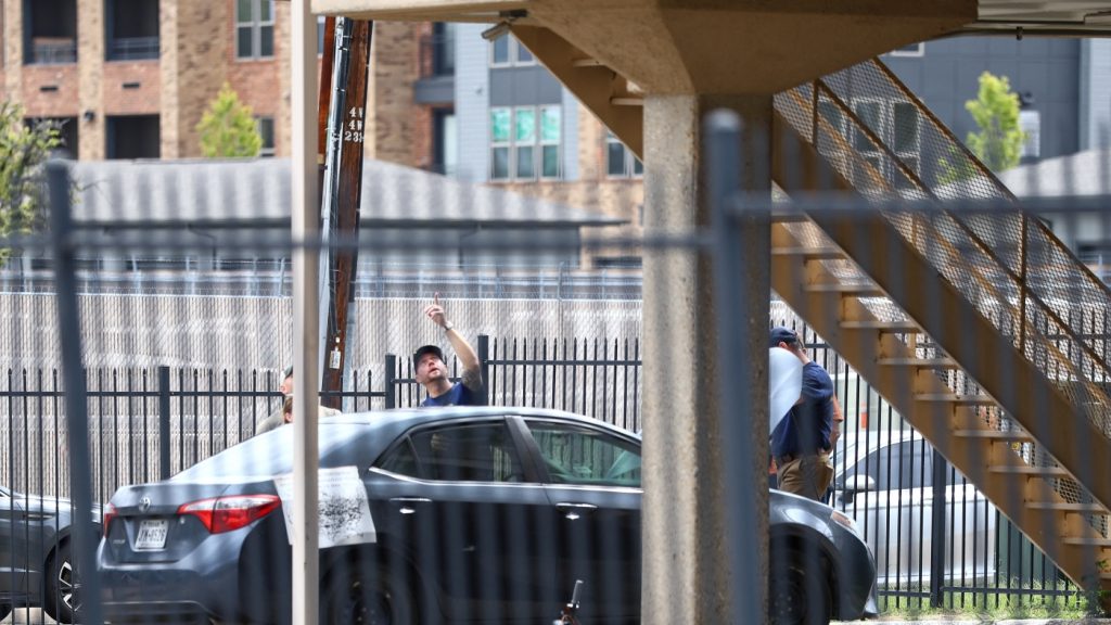 Investigators search gunman's home : NPR