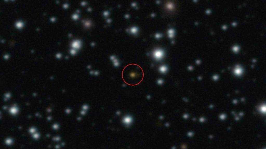 A photograph of the cosmic explosion, circled in red, taken with the Very Large Telescope