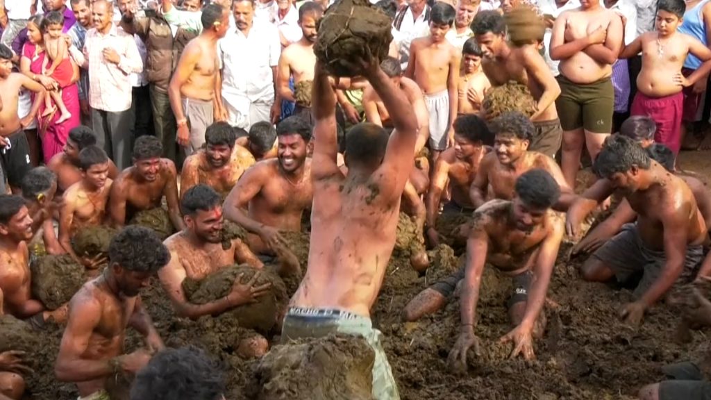 Indian village celebrates end of Diwali with cow dung fight | Religion Indian village celebrates end of Diwali with cow dung fight | Religion