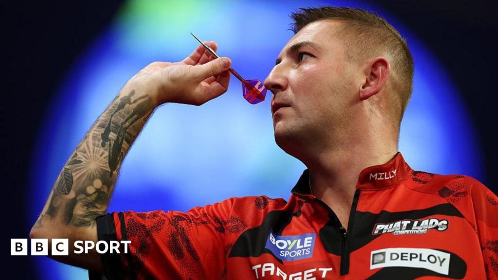 Nathan Aspinall throwing a dart